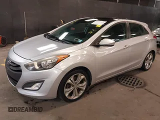 2013 Hyundai Elantra GT with VIN KMHD35LE2DU105677, listed as a IAAI auction lot 42027623 with 137,063 mi miles. Bid and sale history available at carsss.com. Image 17.