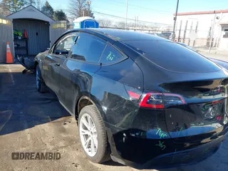 2024 Tesla Model Y Long Range with VIN 7SAYGDEE6RA276983, listed as a IAAI auction lot 41614141 with 4,472 mi miles and . Bid and sale history available at DreamBid. Image 3.