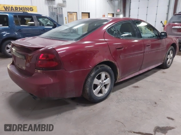 2005 Pontiac Grand Prix z VIN 2G2WP522651347494, wystawiony jako IAAI lot #41967441 z przebiegiem 303 769 mil mil oraz . Historia ofert i sprzedaży dostępna na DreamBid. Obrazek 4.