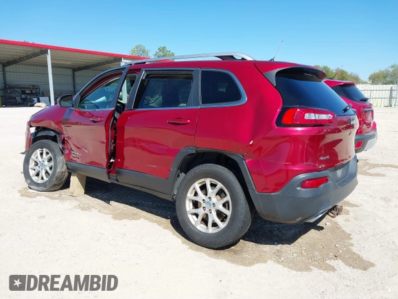 2015 Jeep Cherokee North with VIN 1C4PJMCSXFW654090, listed as a IAAI auction lot 41844434 with 198,592 mi miles. Bid and sale history available at carsss.com. Image 3.