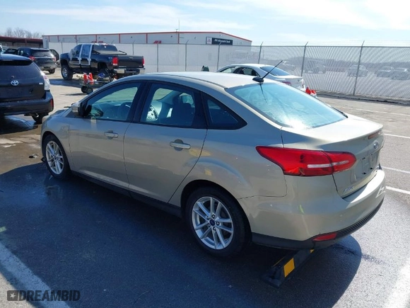 2016 Ford Focus SE with VIN 1FADP3F20GL329724, listed as a IAAI auction lot 41665265 with 131,000 mi miles. Bid and sale history available at carsss.com. Image 3.