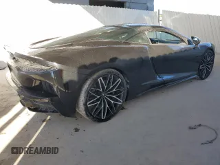 2022 McLaren GT z VIN SBM22GCA4NW001602, wystawiony jako Copart lot #83270334 z przebiegiem 33 668 mil mil oraz Tytuł czysty. Historia ofert i sprzedaży dostępna na DreamBid. Obrazek 3.