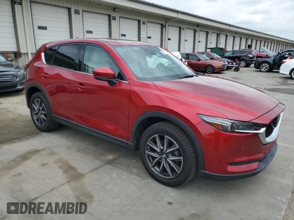 2018 Mazda CX-5 Grand Touring with VIN JM3KFADM8J0444455, listed as a Copart auction lot 59793055 with 60,839 mi miles and Salvage title. Bid and sale history available at DreamBid. Image 4.
