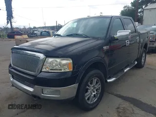 2004 Ford F-150 XLT with VIN 1FTPW14504KA08344, listed as a IAAI auction lot 41916877 with 223,657 mi miles. Bid and sale history available at carsss.com. Image 6.