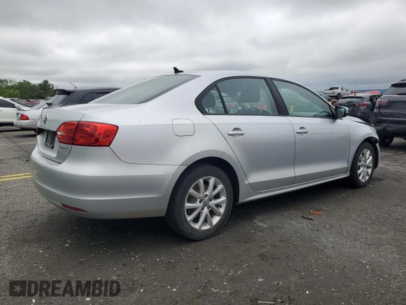 2011 Volkswagen Jetta SE with VIN 3VWDZ7AJ9BM320146, listed as a Copart auction lot 58521605 with 164,045 mi miles and Salvage title. Bid and sale history available at DreamBid. Image 3.