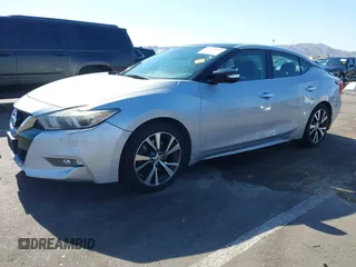 2016 Nissan Maxima SL z VIN 1N4AA6AP3GC377081, wystawiony jako IAAI lot #42235817 z przebiegiem 159 571 mil mil oraz . Historia ofert i sprzedaży dostępna na DreamBid. Obrazek 2.