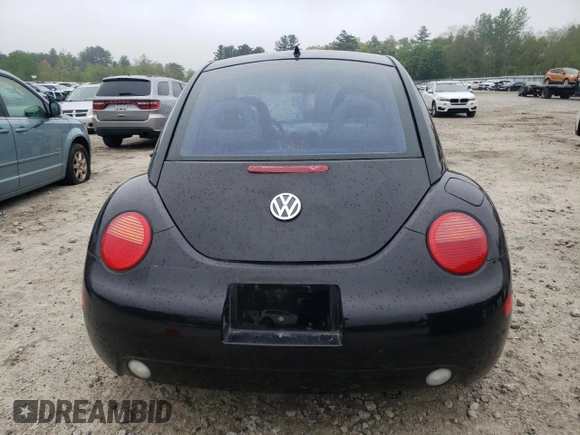 2000 Volkswagen Beetle GLS with VIN 3VWCC21CXYM449877, listed as a Copart auction lot 56603875 with 63,384 mi miles and Clean Title. Bid and sale history available at DreamBid. Image 6.
