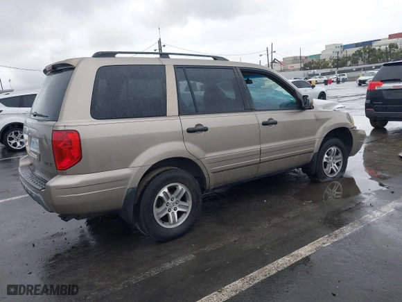 2004 Honda Pilot EX with VIN 2HKYF18604H582741, listed as a IAAI auction lot 41572039 with 225,101 mi miles. Bid and sale history available at carsss.com. Image 4.