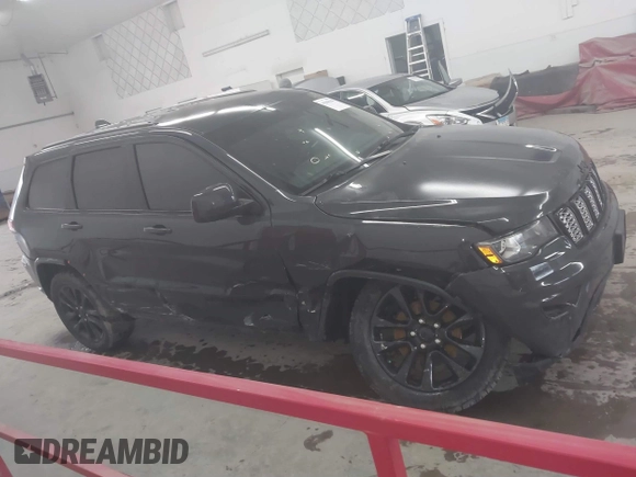 2017 Jeep Grand Cherokee Altitude with VIN 1C4RJFAG9HC886171, listed as a IAAI auction lot 41840198 with 125,616 mi miles and . Bid and sale history available at DreamBid. Image 12.