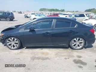 2012 Honda Civic Si z VIN 2HGFB6E57CH700823, wystawiony jako IAAI lot #42477635 z przebiegiem 144 889 mil mil oraz . Historia ofert i sprzedaży dostępna na DreamBid. Obrazek 14.