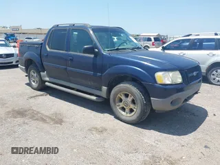 2003 Ford Explorer Sport Trac XLS z VIN 1FMZU77E53UB66531, wystawiony jako IAAI lot #42509028 z przebiegiem 199 323 mil mil oraz . Historia ofert i sprzedaży dostępna na DreamBid. Obrazek 1.