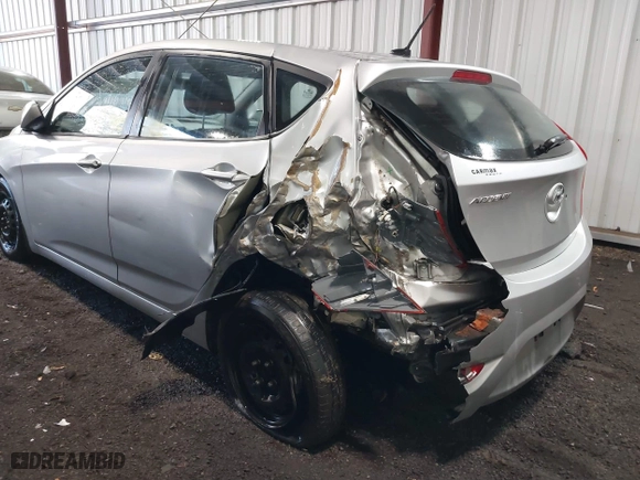 2013 Hyundai Accent GL with VIN KMHCT5AE7DU083867, listed as a IAAI auction lot 41390970 with 160,630 mi miles. Bid and sale history available at carsss.com. Image 6.