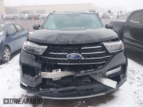 2021 Ford Explorer XLT with VIN 1FMSK8DH0MGA59737, listed as a IAAI auction lot 41474554 with 74,536 mi miles. Bid and sale history available at carsss.com. Image 12.