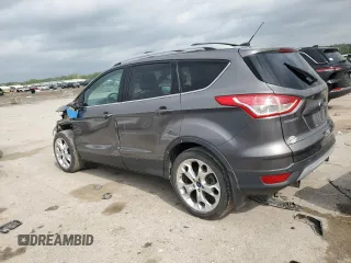 2013 Ford Escape Titanium z VIN 1FMCU0J98DUB64363, wystawiony jako Copart lot #54772925 z przebiegiem 109 956 mil mil oraz Szkody całkowita. Historia ofert i sprzedaży dostępna na DreamBid. Obrazek 2.