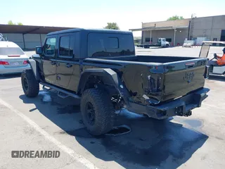 2020 Jeep Gladiator Sport S with VIN 1C6HJTAGXLL123540, listed as a IAAI auction lot 42453999 with 27,855 mi miles and . Bid and sale history available at DreamBid. Image 3.