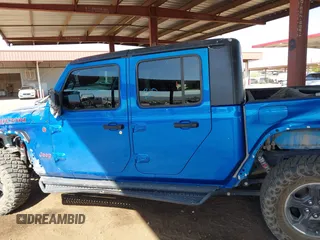 2021 Jeep Gladiator Rubicon with VIN 1C6JJTBGXML516164, listed as a IAAI auction lot 41837544 with 48,197 mi miles and . Bid and sale history available at DreamBid. Image 13.