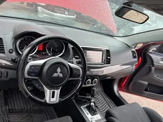 2008 Mitsubishi Lancer Evolution MR z VIN JA3AW56V78U051033, wystawiony jako Copart lot #82855894 z przebiegiem 92 726 mil mil oraz Szkoda całkowita • Salvage title. Historia ofert i sprzedaży dostępna na DreamBid. Obrazek 9.