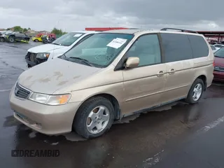 1999 Honda Odyssey EX z VIN 2HKRL1867XH535563, wystawiony jako IAAI lot #42188335 z przebiegiem 198 322 mil mil oraz . Historia ofert i sprzedaży dostępna na DreamBid. Obrazek 2.