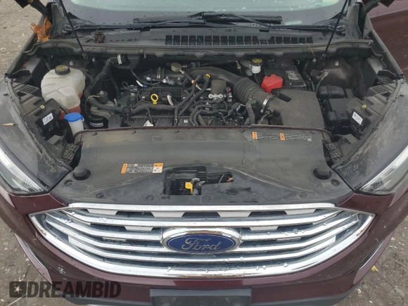 2019 Ford Edge SEL with VIN 2FMPK4J92KBB34891, listed as a Copart auction lot 60050945 with 104,942 mi miles and Salvage title. Bid and sale history available at DreamBid. Image 12.