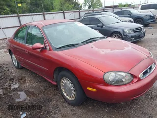 1999 Mercury Sable GS with VIN 1MEFM50UXXA649466, listed as a IAAI auction lot 42094811 with 122,644 mi miles. Bid and sale history available at carsss.com. Image 1.