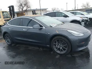 2018 Tesla Model 3 Long Range Battery with VIN 5YJ3E1EB1JF149423, listed as a IAAI auction lot 41896090 with 158,787 mi miles and . Bid and sale history available at DreamBid. Image 14.