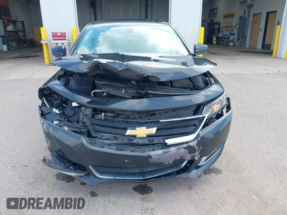 2014 Chevrolet Impala LS with VIN 1G11X5SL0EU164667, listed as a IAAI auction lot 42542110 with 150,458 mi miles and . Bid and sale history available at DreamBid. Image 12.