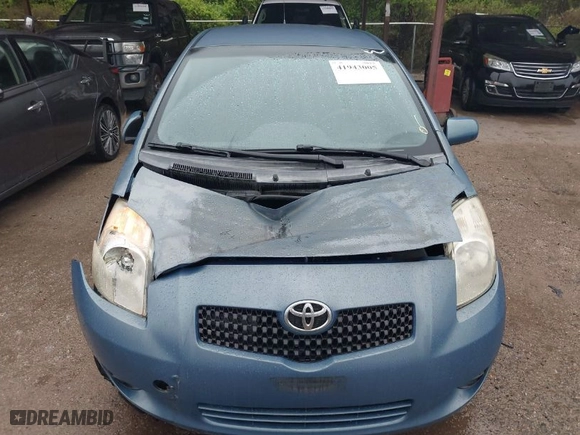 2007 Toyota Yaris with VIN JTDJT923275080633, listed as a IAAI auction lot 41943005 with 157,643 mi miles. Bid and sale history available at carsss.com. Image 6.