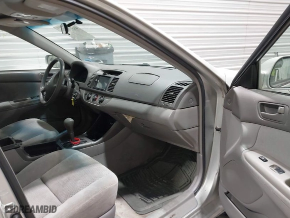 2004 Toyota Camry LE with VIN 4T1BF32K74U568974, listed as a IAAI auction lot 41590644 with 129,461 mi miles. Bid and sale history available at carsss.com. Image 5.