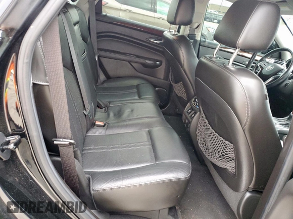 2015 Cadillac SRX Premium Collection z VIN 3GYFNDE33FS574125, wystawiony jako Copart lot #55530575 z przebiegiem 76 956 mil mil oraz Szkoda całkowita • Salvage title. Historia ofert i sprzedaży dostępna na DreamBid. Obrazek 11.