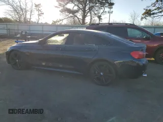 2015 BMW 4 Series 435i with VIN WBA4B1C51FG241555, listed as a Copart auction lot 82226744 with 94,350 mi miles and Salvage Title. Bid and sale history available at DreamBid. Image 2.