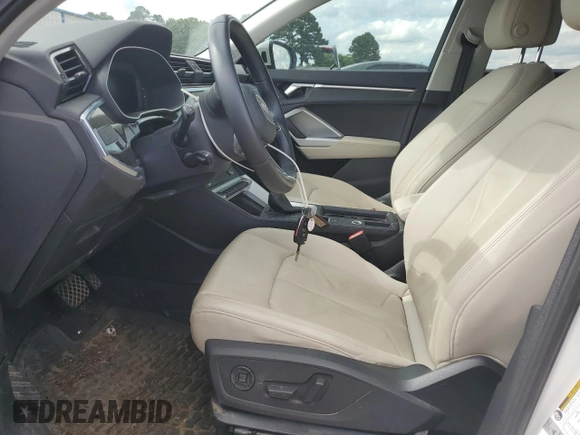 2020 Audi Q3 S line Premium with VIN WA1DECF32L1104309, listed as a Copart auction lot 57162424 with 68,523 mi miles and Salvage title. Bid and sale history available at DreamBid. Image 7.
