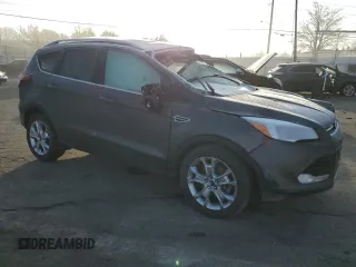 2015 Ford Escape Titanium with VIN 1FMCU0J99FUA26849, listed as a Copart auction lot 50583825 with Not provided miles and Salvage title. Bid and sale history available at DreamBid. Image 4.