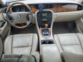 2004 Jaguar XJ VDP with VIN SAJWA74C64SG27143, listed as a Copart auction lot 71373744 with 129,942 mi miles and Salvage Title. Bid and sale history available at carsss.com. Image 8.