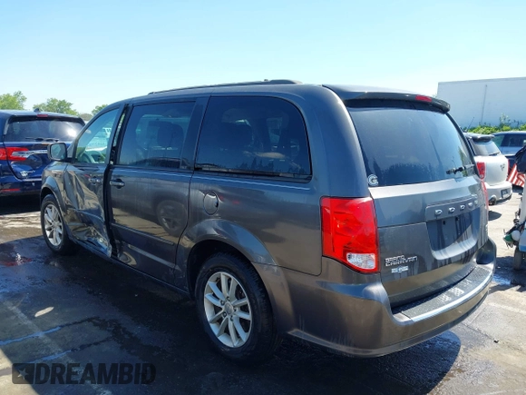 2015 Dodge Grand Caravan SXT with VIN 2C4RDGCG4FR631362, listed as a IAAI auction lot 42027066 with 149,599 mi miles and . Bid and sale history available at DreamBid. Image 14.