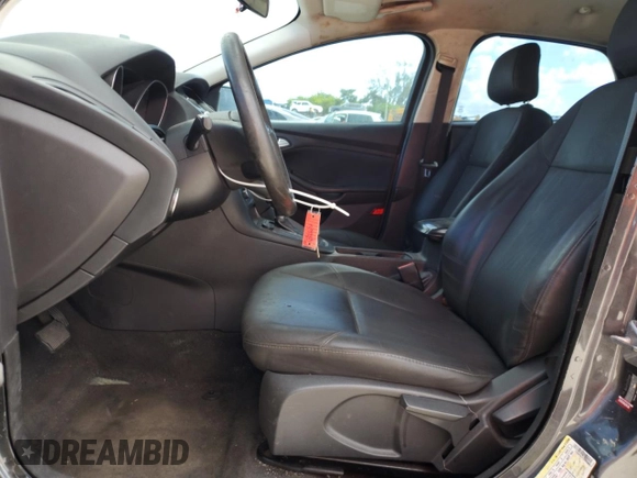 2018 Ford Focus SE with VIN 1FADP3F21JL298832, listed as a Copart auction lot 61262655 with 122,331 mi miles and Clean title. Bid and sale history available at DreamBid. Image 7.