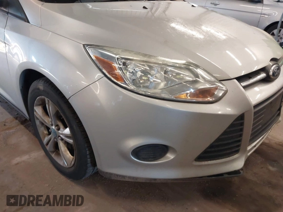 2013 Ford Focus SE z VIN 1FADP3F24DL277767, wystawiony jako IAAI lot #41562390 z przebiegiem 183 322 mil mil oraz . Historia ofert i sprzedaży dostępna na DreamBid. Obrazek 12.