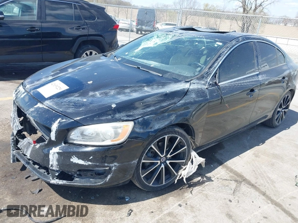 2016 Volvo S60 T5 Drive-E Premier z VIN YV126MFK5G1398229, wystawiony jako IAAI lot #42039229 z przebiegiem 99 604 mil mil oraz . Historia ofert i sprzedaży dostępna na DreamBid. Obrazek 2.