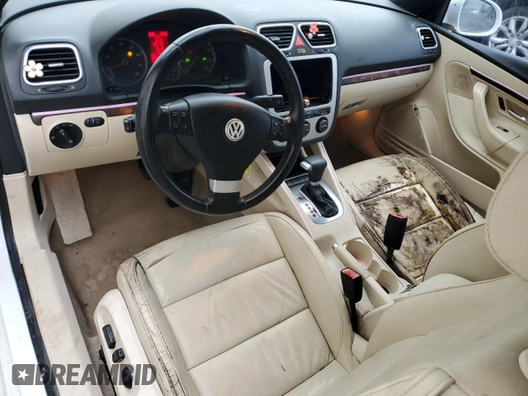 2007 Volkswagen Eos 2.0T with VIN WVWFA71F57V052000, listed as a Copart auction lot 87598495 with 128,610 mi miles and Salvage Title. Bid and sale history available at DreamBid. Image 8.