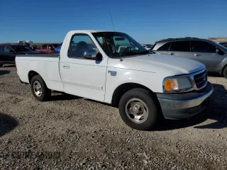 2001 Ford F-150 XL with VIN 1FTRF17L71KF23792, listed as a Copart auction lot 79770894 with Not provided miles and Salvage title. Bid and sale history available at DreamBid. Image 4.