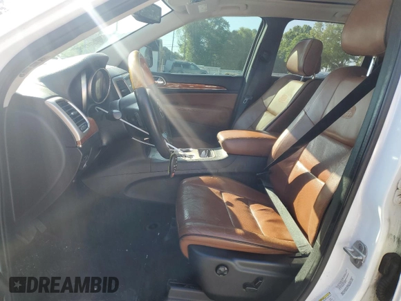 2013 Jeep Grand Cherokee Overland with VIN 1C4RJECT7DC588233, listed as a Copart auction lot 52672605 with 231,329 mi miles and Salvage Title. Bid and sale history available at carsss.com. Image 7.