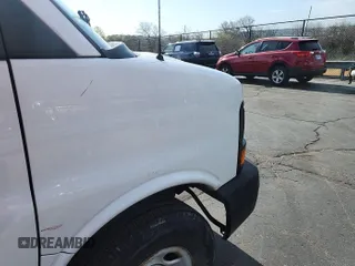 2012 Chevrolet Express Cargo Van with VIN 1GCWGFCA0C1174842, listed as a IAAI auction lot 42141778 with 266,894 mi miles. Bid and sale history available at carsss.com. Image 1.