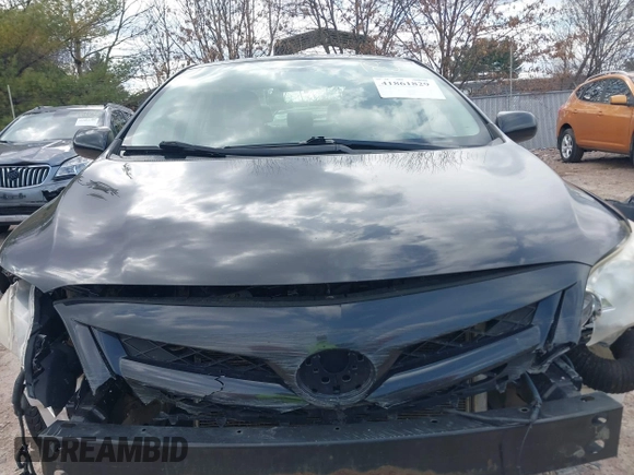 2012 Toyota Corolla L with VIN JTDBU4EE8C9180465, listed as a IAAI auction lot 41861829 with 163,631 mi miles. Bid and sale history available at carsss.com. Image 12.