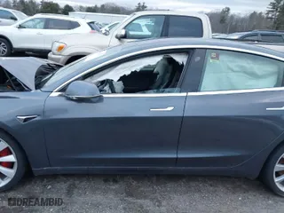 2019 Tesla Model 3 Long Range with VIN 5YJ3E1EB1KF231220, listed as a IAAI auction lot 41078766 with 28,485 mi miles. Bid and sale history available at carsss.com. Image 14.
