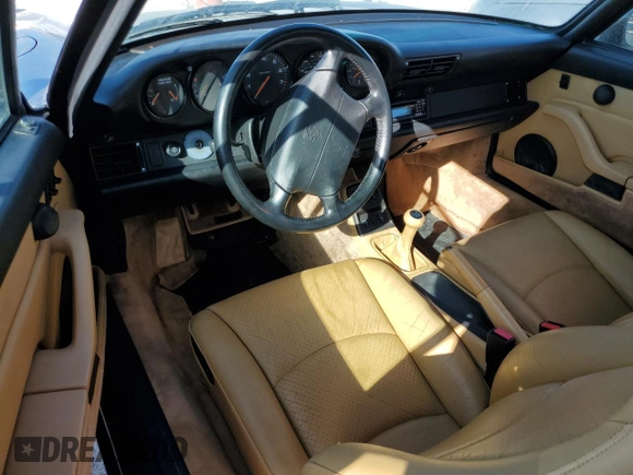 1995 Porsche 911 Carrera with VIN WP0AA2990SS323244, listed as a Copart auction lot 77215074 with 0 mi miles and Non Repairable. Bid and sale history available at carsss.com. Image 8.