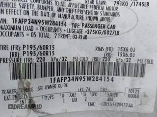 2005 Ford Focus S with VIN 1FAFP34N95W284154, listed as a IAAI auction lot 42555736 with 171,944 mi miles and . Bid and sale history available at DreamBid. Image 9.