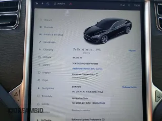 2013 Tesla Model S with VIN 5YJSA1CN8DFP06126, listed as a Copart auction lot 63098515 with 47,215 mi miles and Clean title. Bid and sale history available at DreamBid. Image 9.
