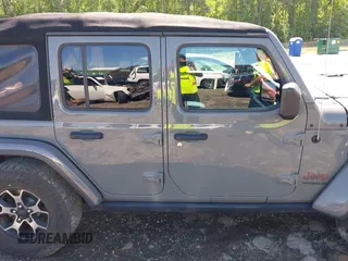 2018 Jeep Wrangler Unlimited Rubicon with VIN 1C4HJXFG6JW267087, listed as a IAAI auction lot 42235058 with 93,962 mi miles and . Bid and sale history available at DreamBid. Image 12.