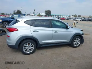 2019 Hyundai Tucson Value with VIN KM8J3CA46KU962082, listed as a IAAI auction lot 42160288 with 92,887 mi miles and . Bid and sale history available at DreamBid. Image 14.