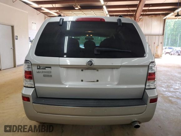 2009 Mercury Mariner Premier z VIN 4M2CU87GX9KJ17731, wystawiony jako Copart lot #54204855 z przebiegiem 54 521 mil mil oraz Szkody całkowita. Historia ofert i sprzedaży dostępna na DreamBid. Obrazek 6.