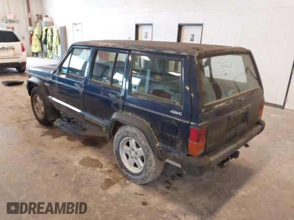 1996 Jeep Cherokee SE z VIN 1J4FJ28S8TL200825, wystawiony jako IAAI lot #42513038 z przebiegiem 226 914 mil mil oraz . Historia ofert i sprzedaży dostępna na DreamBid. Obrazek 3.